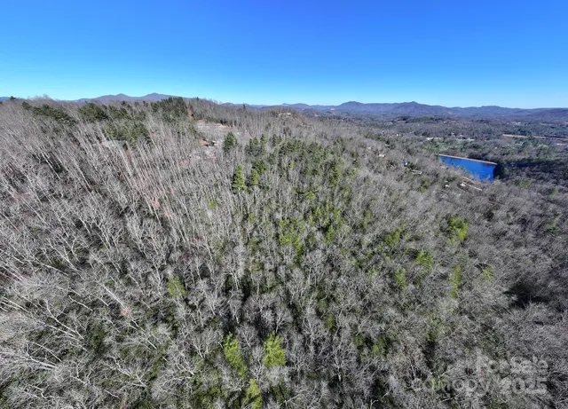 a view of a swimming pool with sitting area