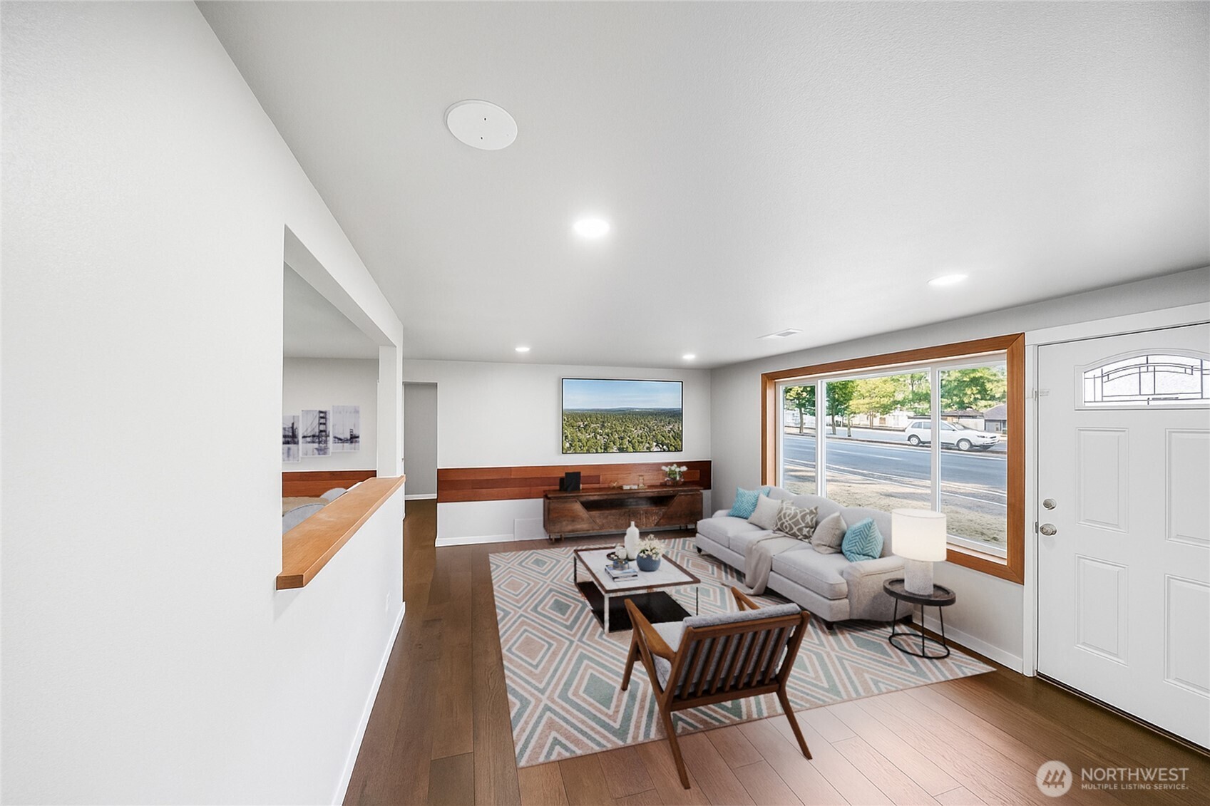 4908 236th Street Southwest Mountlake Terrace, WA 98043 - Photo 10 of 21 a living room with furniture and a large window