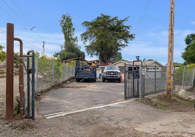 a view of a park with car parked