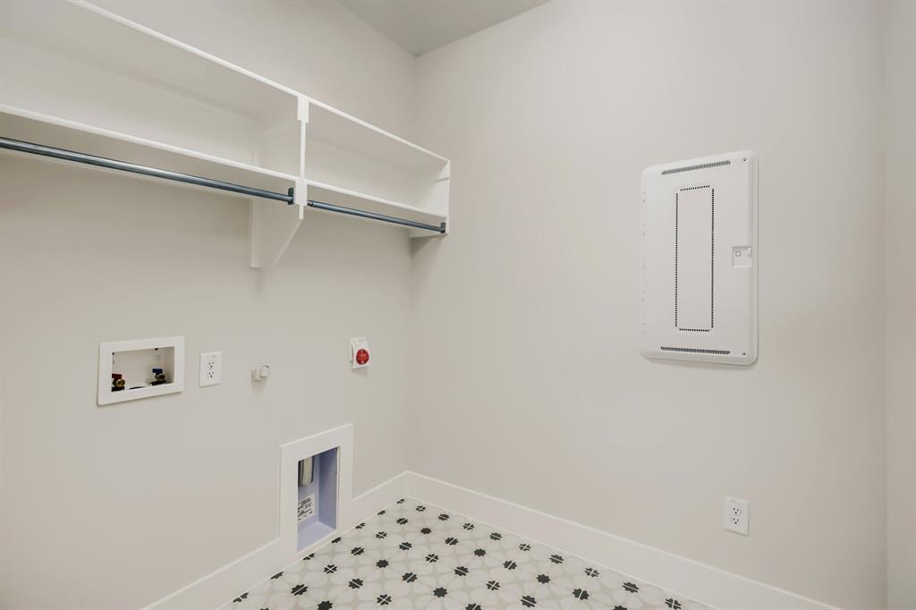 4414 Windy Point Road Oak Point, TX 75068 - Photo 22 of 27 a bathroom with a window and a shower