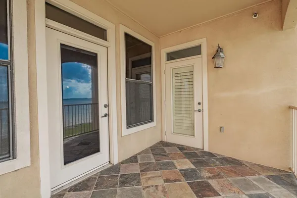 a view of a wrought iron fences in front of house