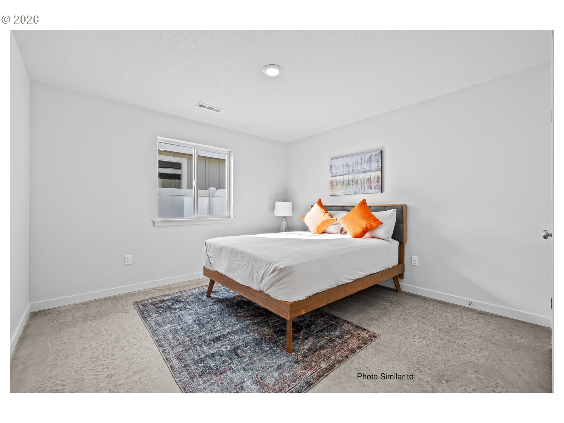 640 Jimmy Street Stanfield, OR 97875 - Photo 3 of 11 a bedroom with a bed and window