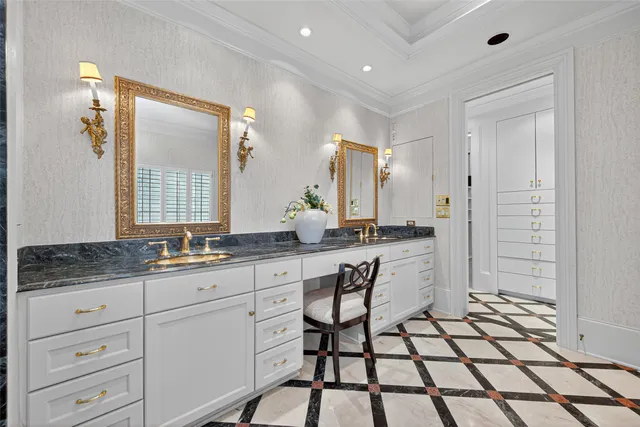 a kitchen that has a sink and a stove