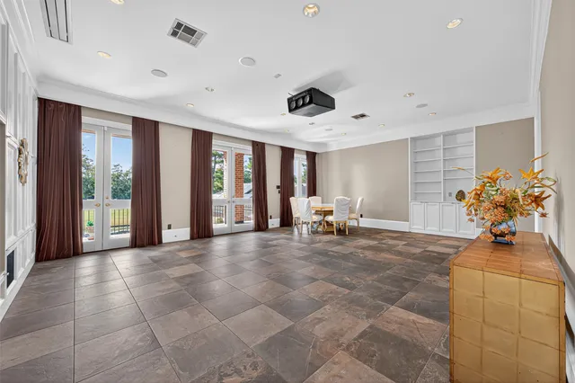 a view of a livingroom with furniture and a table