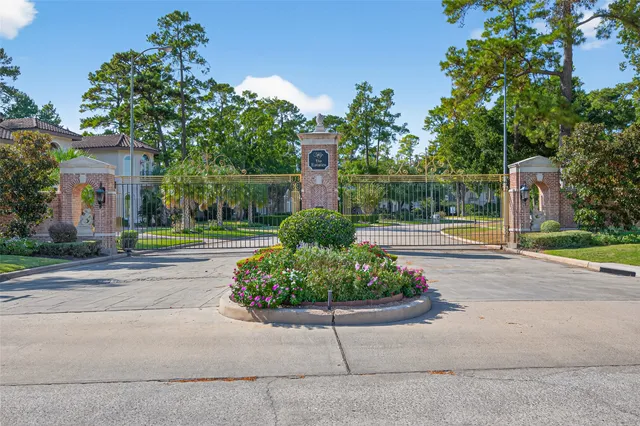 an aerial view of residential house with outdoor space and seating