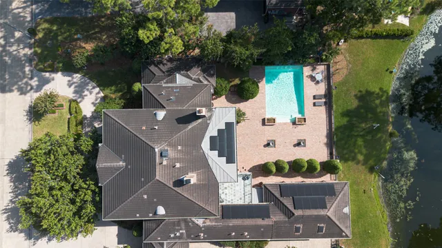 a view of a swimming pool with a patio