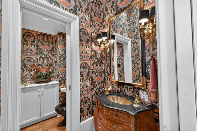 a bathroom with a bathtub and a sink