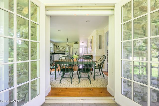 a view of dining room and wooden floor