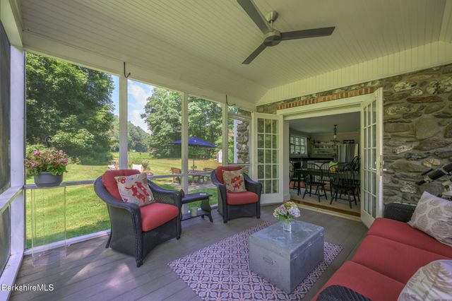 a outdoor living space with furniture and garden view