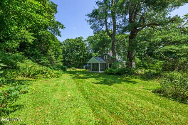 a view of a big yard of a house
