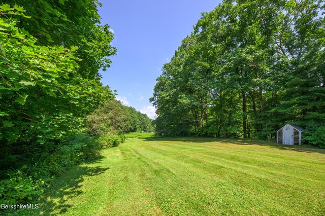 a house view with a outdoor space