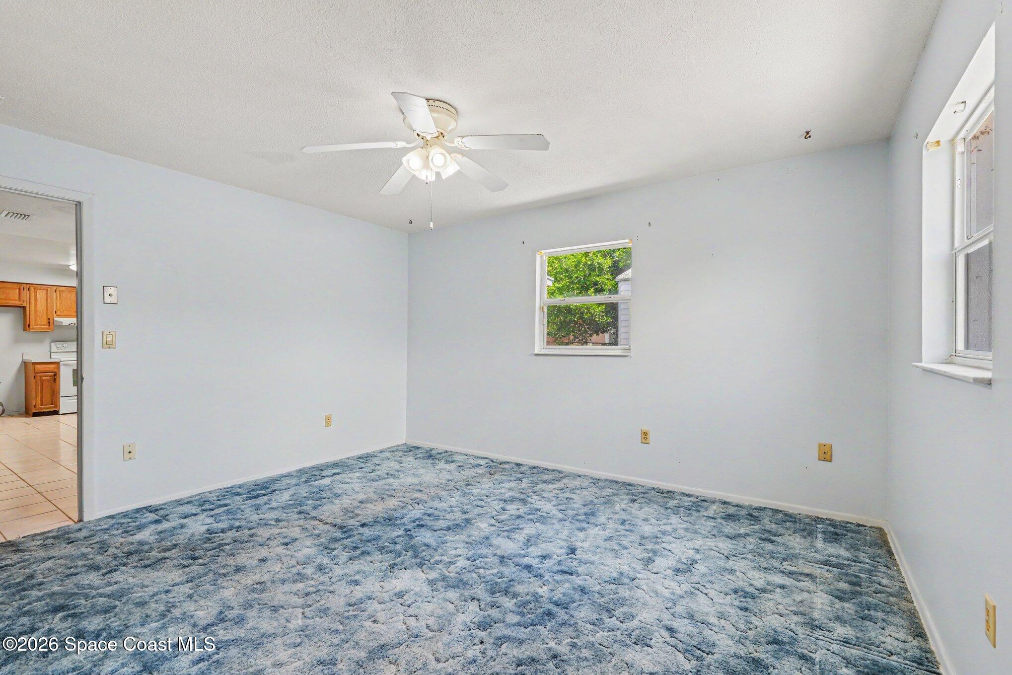 1671 Rice Avenue Titusville, FL 32796 - Photo 14 of 23 a view of empty room with window