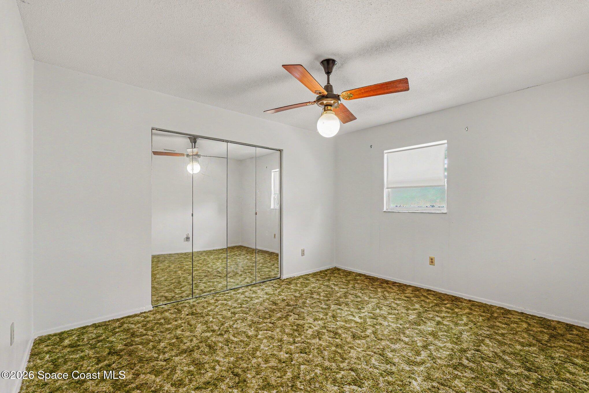 1671 Rice Avenue Titusville, FL 32796 - Photo 18 of 23 a view of a bedroom