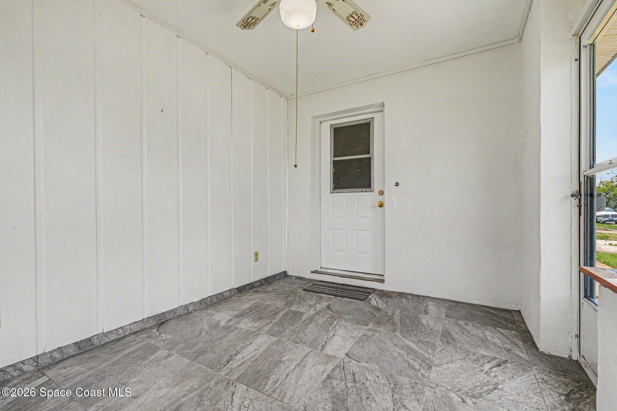 1671 Rice Avenue Titusville, FL 32796 - Photo 20 of 23 a view of empty room with ceiling fan