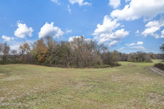 a view of an ocean and mountain