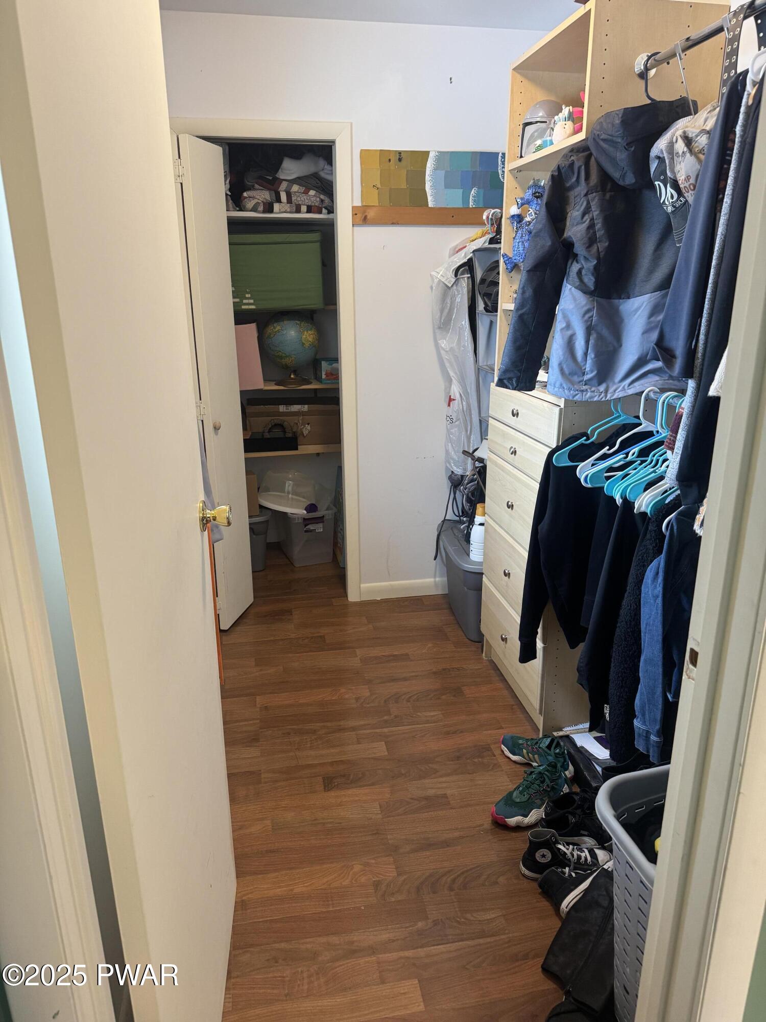 360 South Baker Road Waymart, PA 18472 - Photo 19 of 35 a view of walk in closet with clothes and shoes