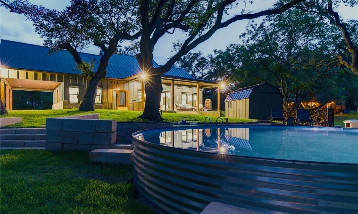 2001 Granite Cove Road Kingsland, TX 78639 - Photo 4 of 42 a front view of a house with garden