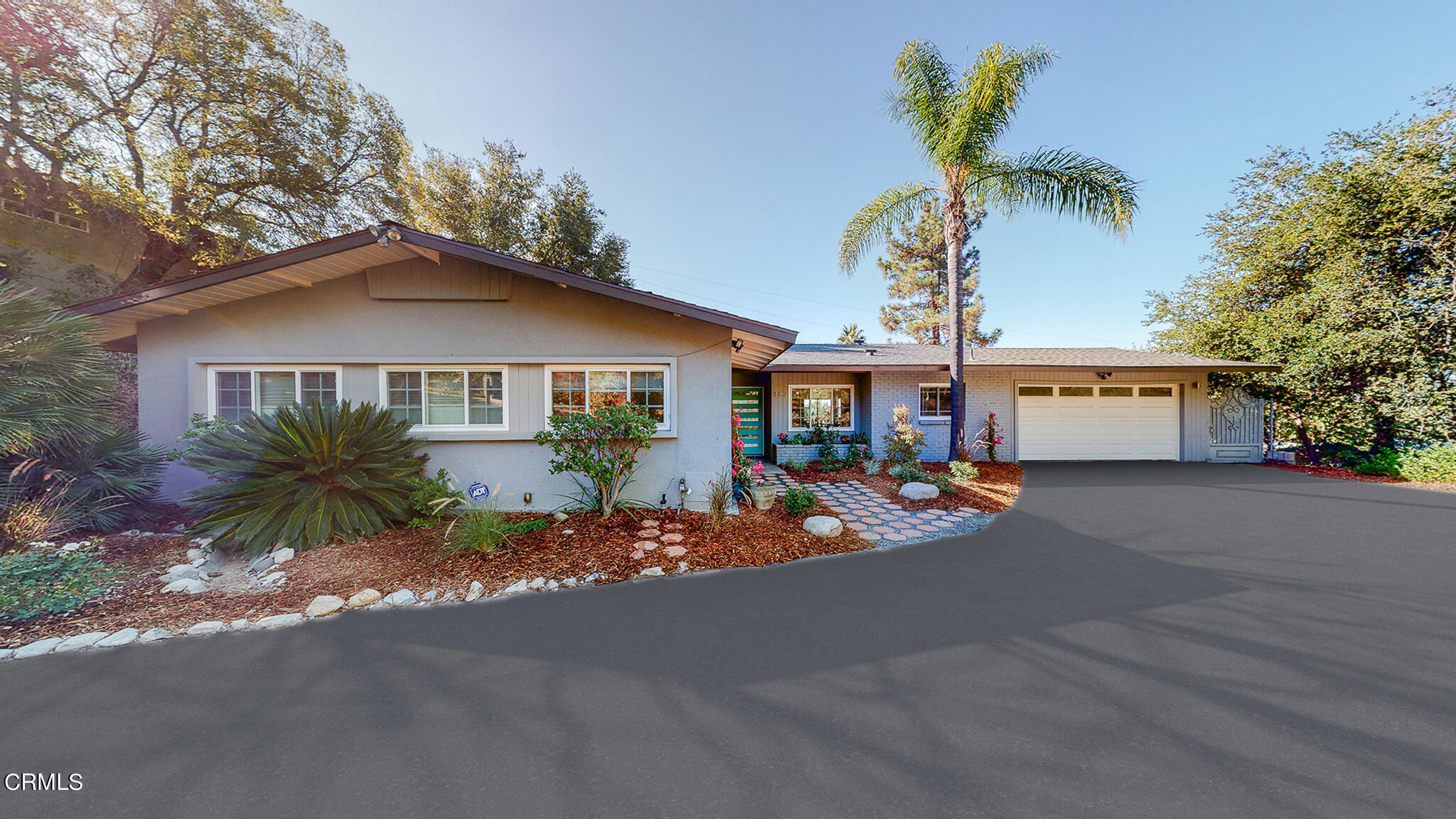 462 Devonwood Road Altadena, CA 91001 - Photo 1 of 39 a front view of a house with a yard and garage