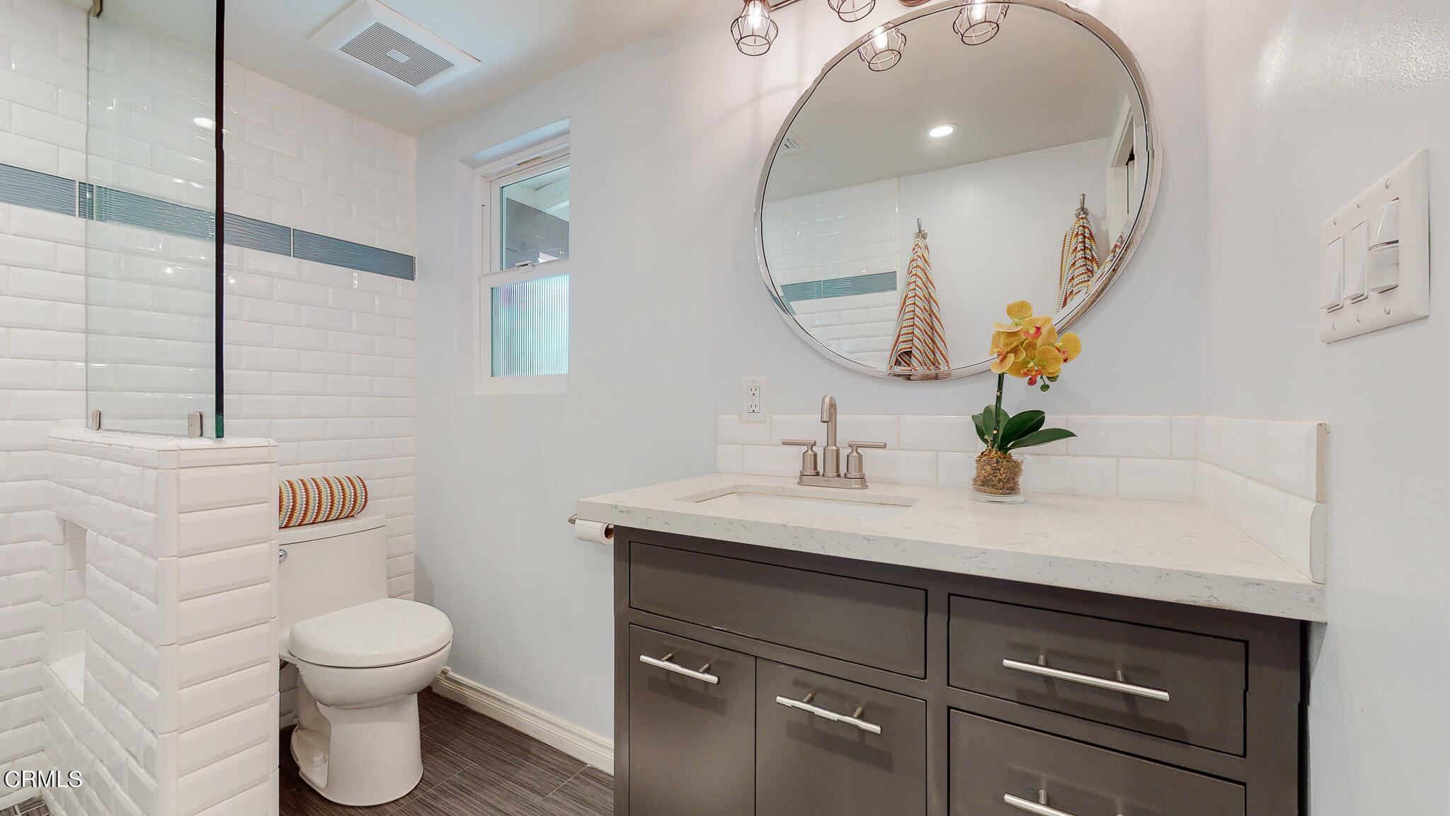 462 Devonwood Road Altadena, CA 91001 - Photo 27 of 39 a bathroom with a toilet sink and mirror