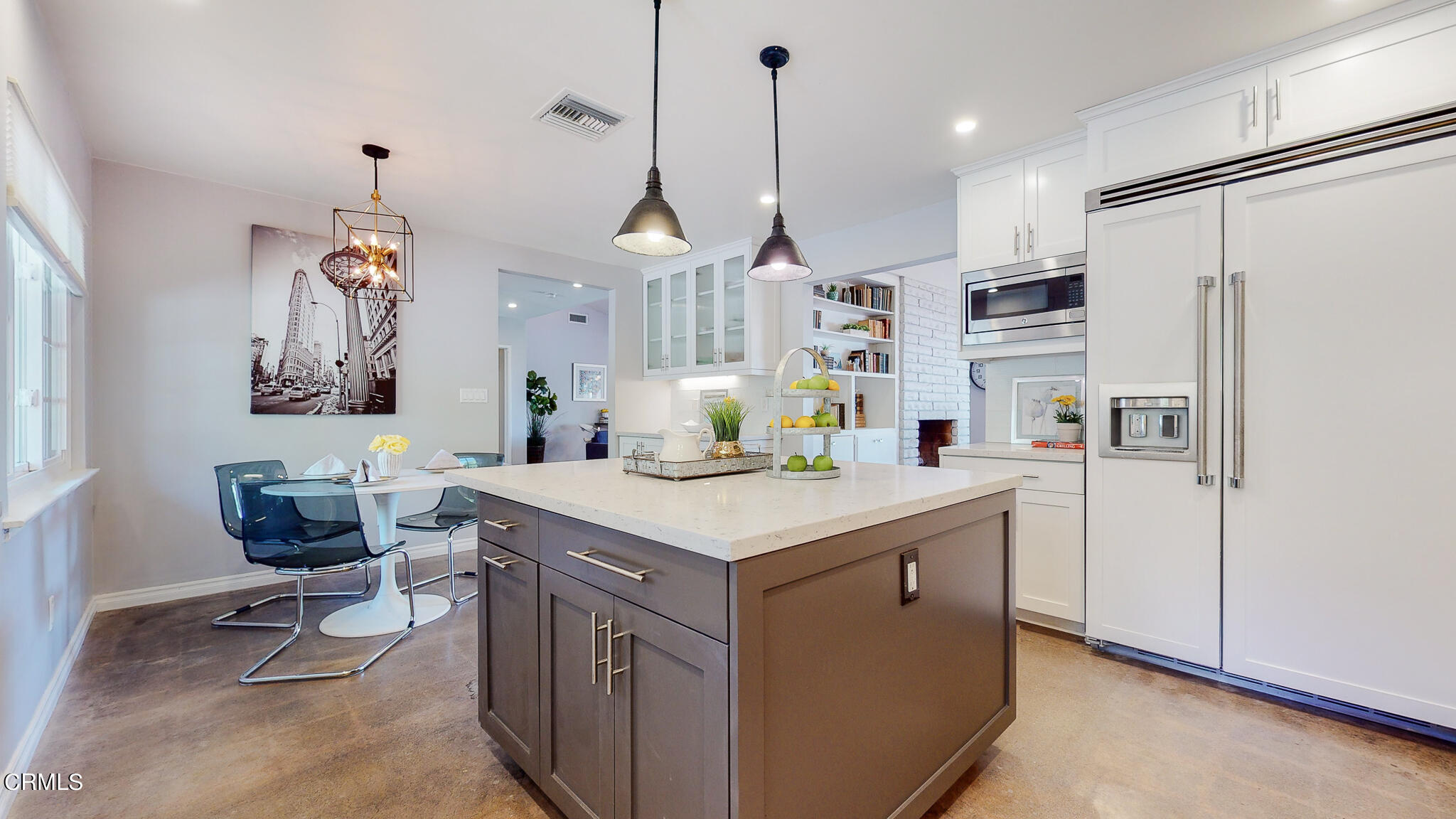 462 Devonwood Road Altadena, CA 91001 - Photo 9 of 39 a kitchen with a refrigerator a sink dishwasher a dining table and chairs