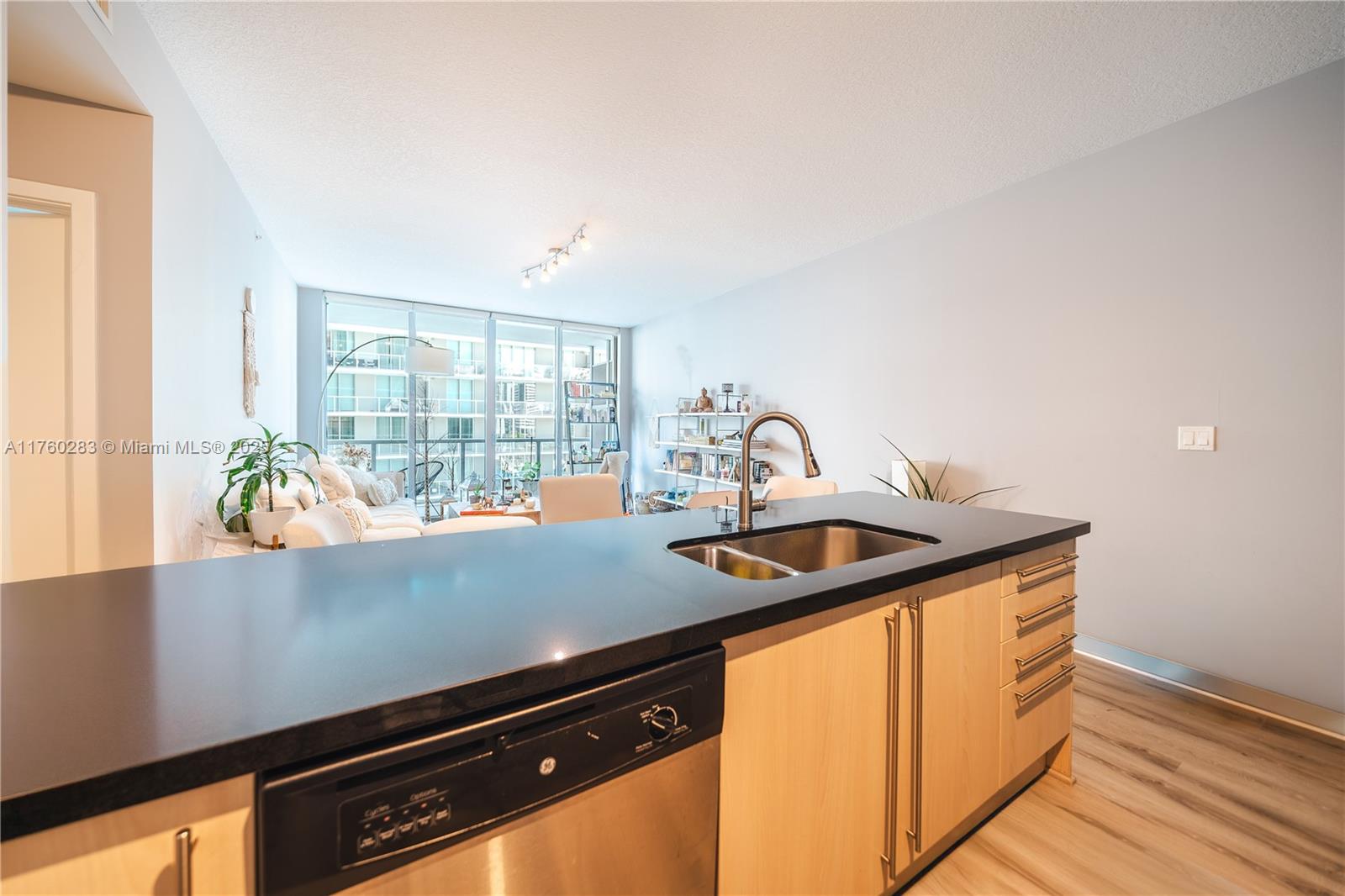 1111 Southwest 1st Avenue, Unit 1115N Miami, FL 33130 - Photo 9 of 27 a kitchen with a sink and a window