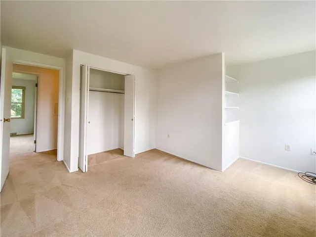 an empty room with closet