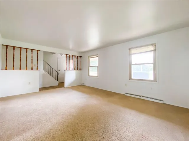 an empty room with windows
