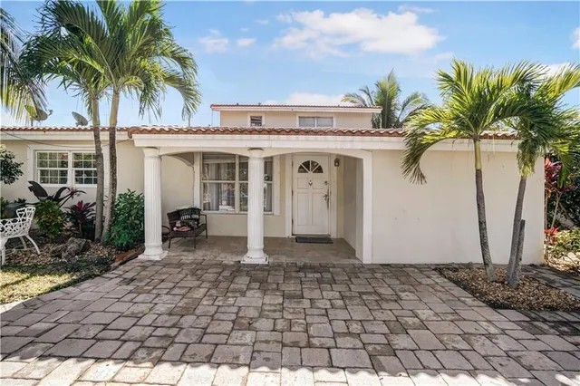 a front view of a house with balcony