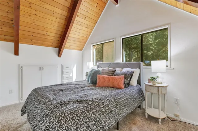 a view of an empty room with a empty space and a window