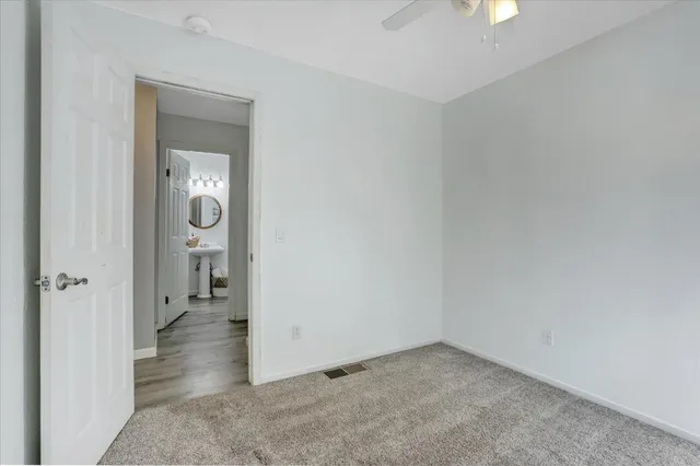 a view of a house with backyard