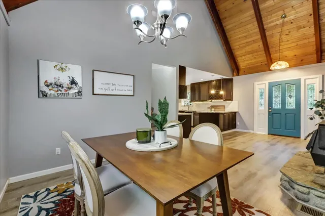 a kitchen with granite countertop stainless steel appliances and wooden cabinets