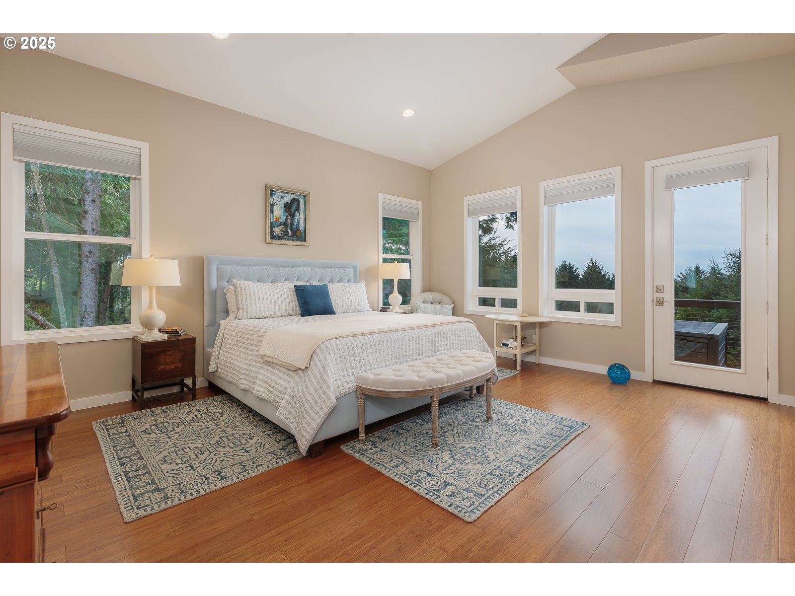 108 Sea Crest Court Otter Rock, OR 97369 - Photo 17 of 45 a bedroom with a bed a table and windows