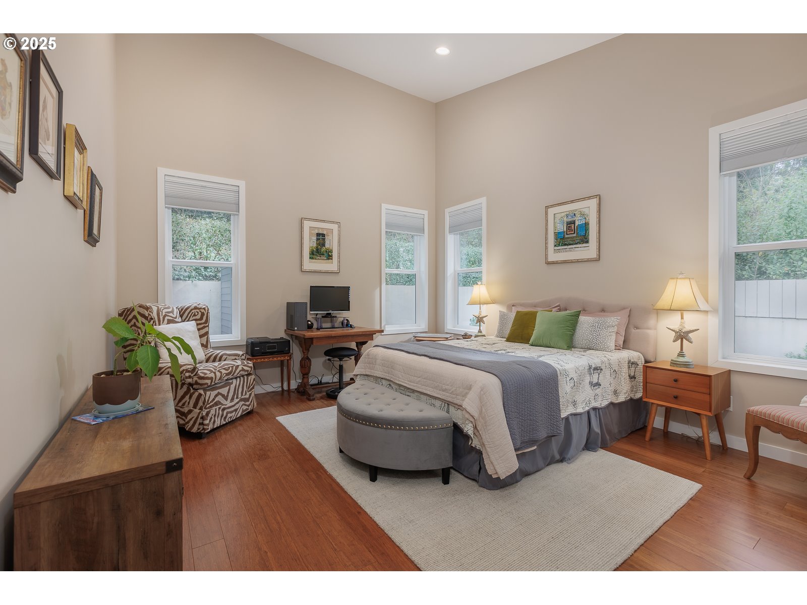 108 Sea Crest Court Otter Rock, OR 97369 - Photo 24 of 45 a spacious bedroom with a bed a table and chair