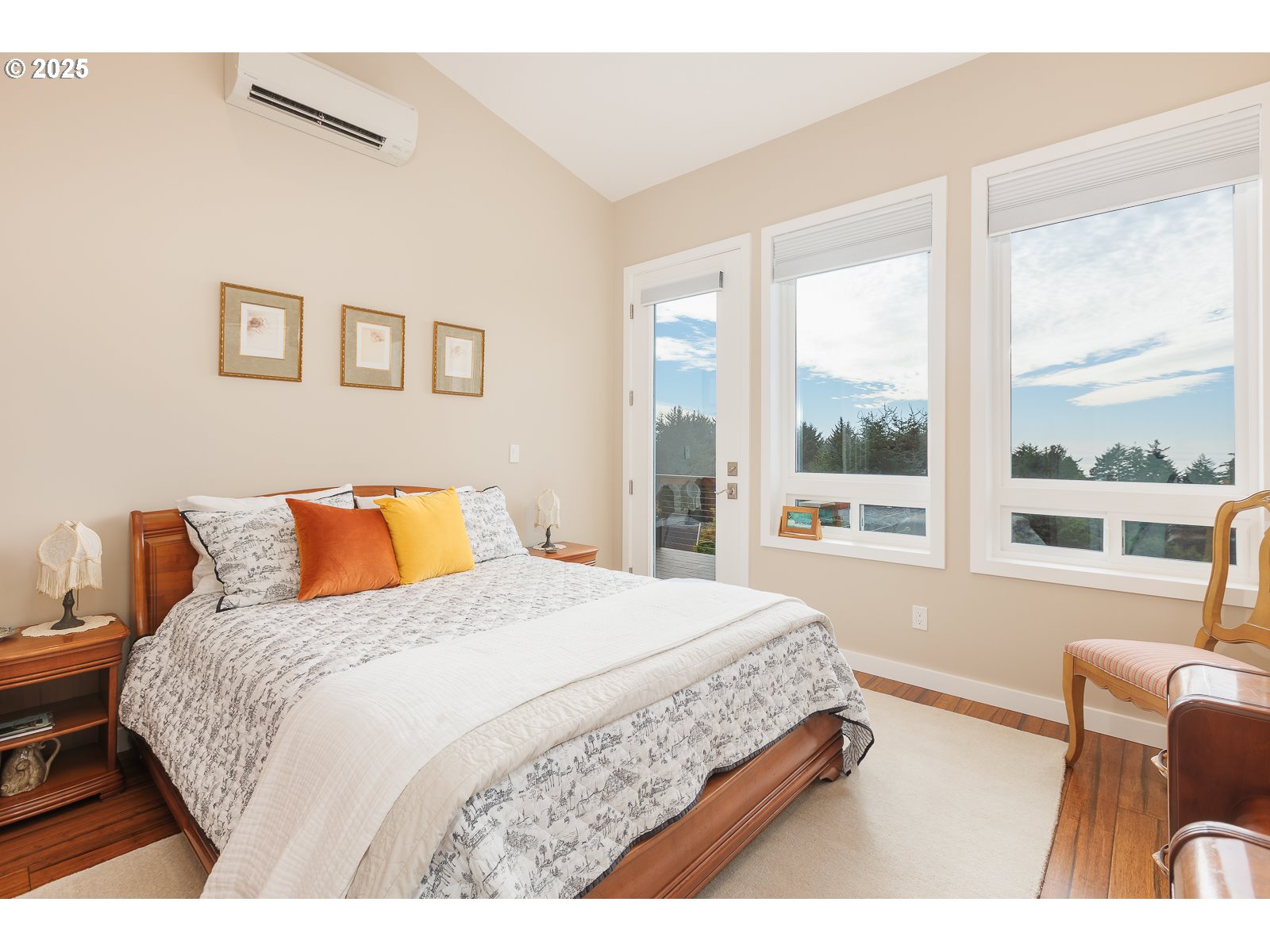 108 Sea Crest Court Otter Rock, OR 97369 - Photo 28 of 45 a bedroom with a bed and a large window