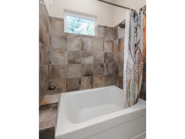 a bathroom with a bathtub