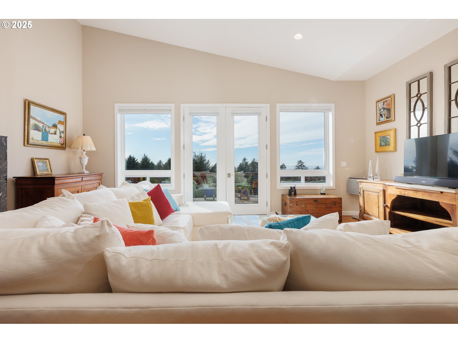 108 Sea Crest Court Otter Rock, OR 97369 - Photo 6 of 45 a living room with furniture wooden floor and a large window