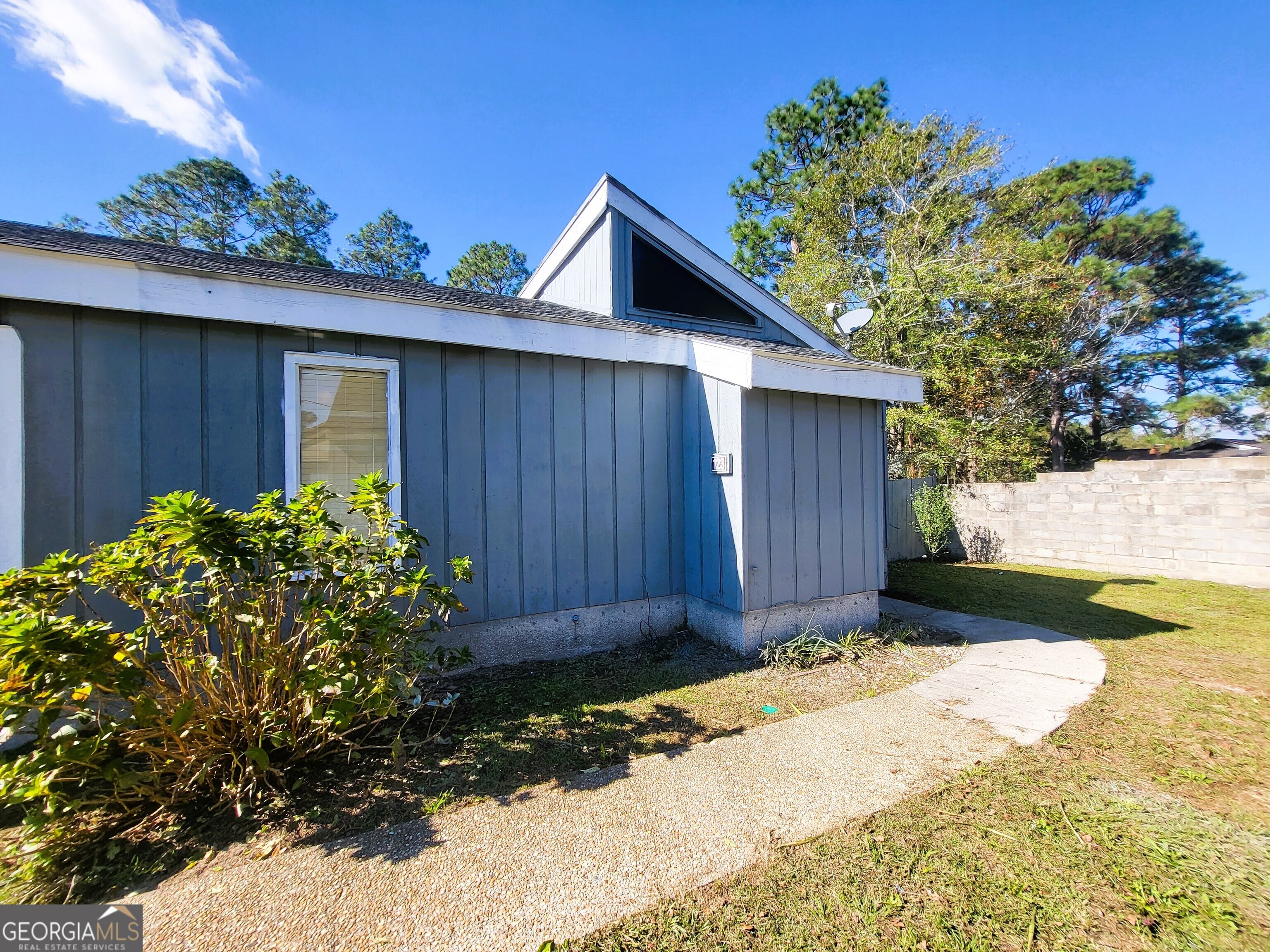 123 Valley Road Statesboro, GA 30458 - Photo 1 of 1 a view of backyard with plants and trees