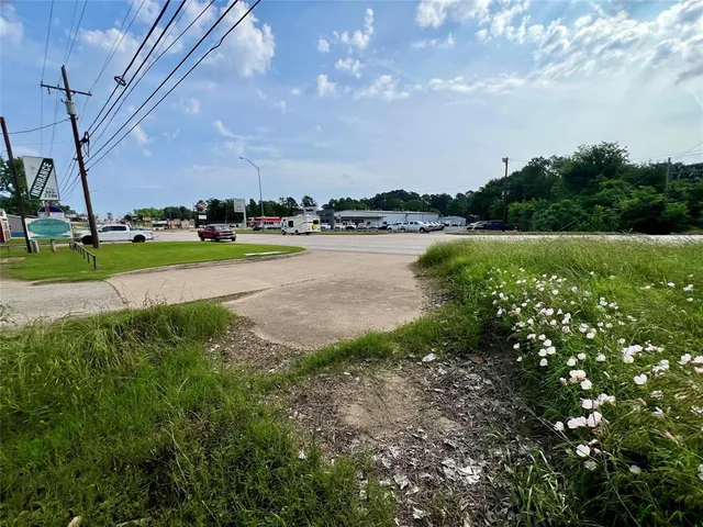 a view of a lake with houses in the back