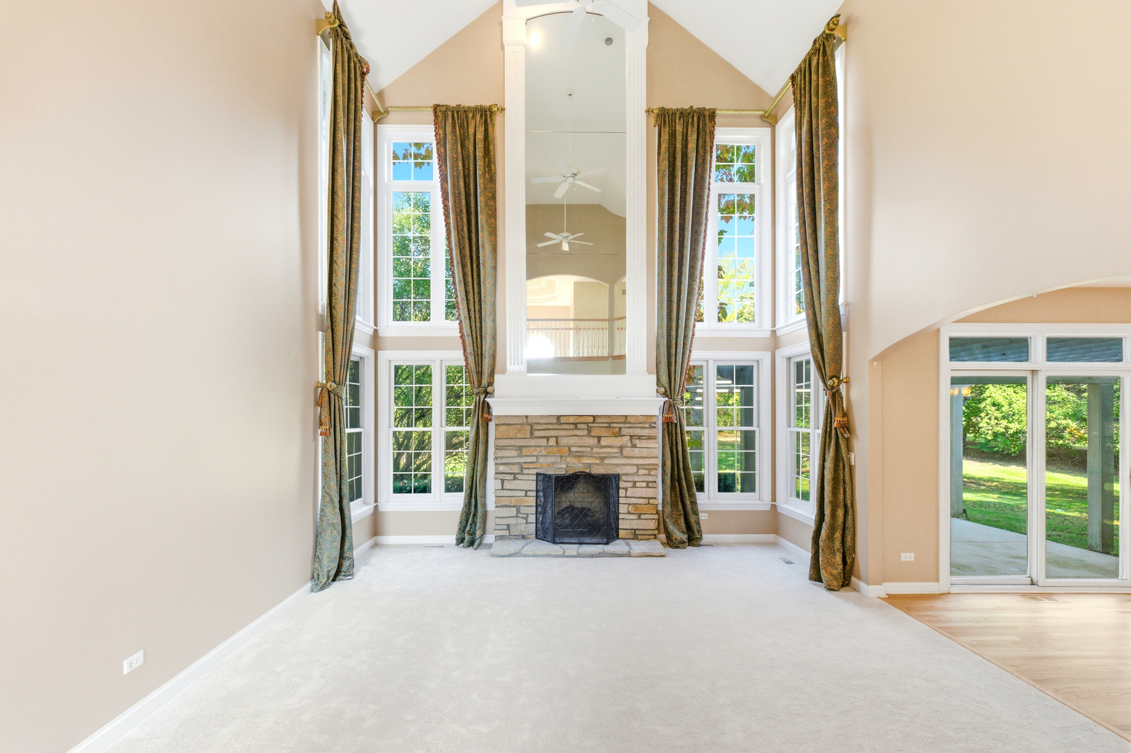 37-w004 Ridgewood Drive St. Charles, IL 60175 - Photo 13 of 44 a view of a livingroom with furniture and a fireplace