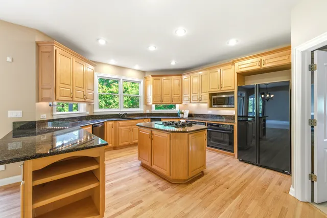 a view of a room with wooden walls