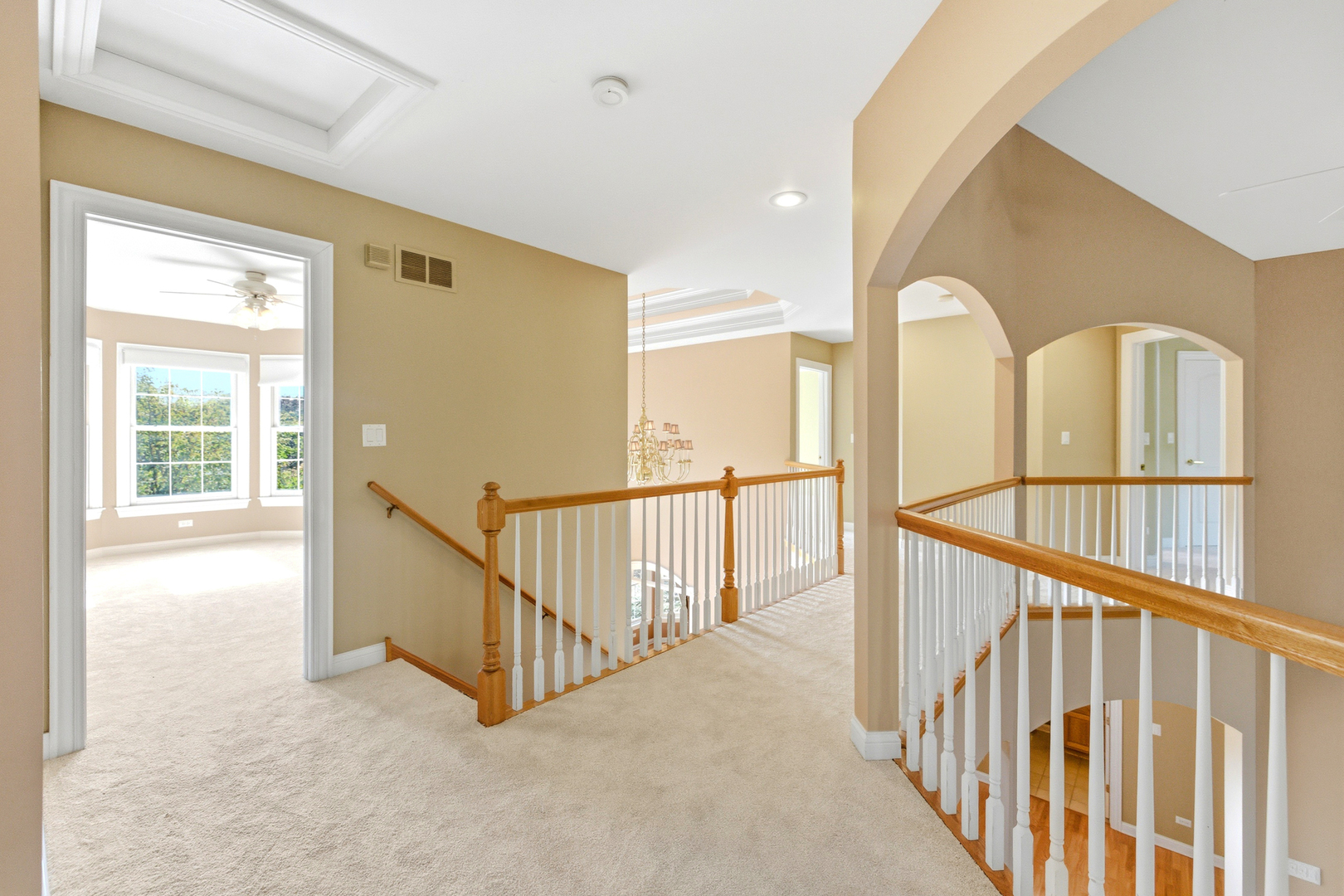 37-w004 Ridgewood Drive St. Charles, IL 60175 - Photo 20 of 44 a view of staircase with three windows
