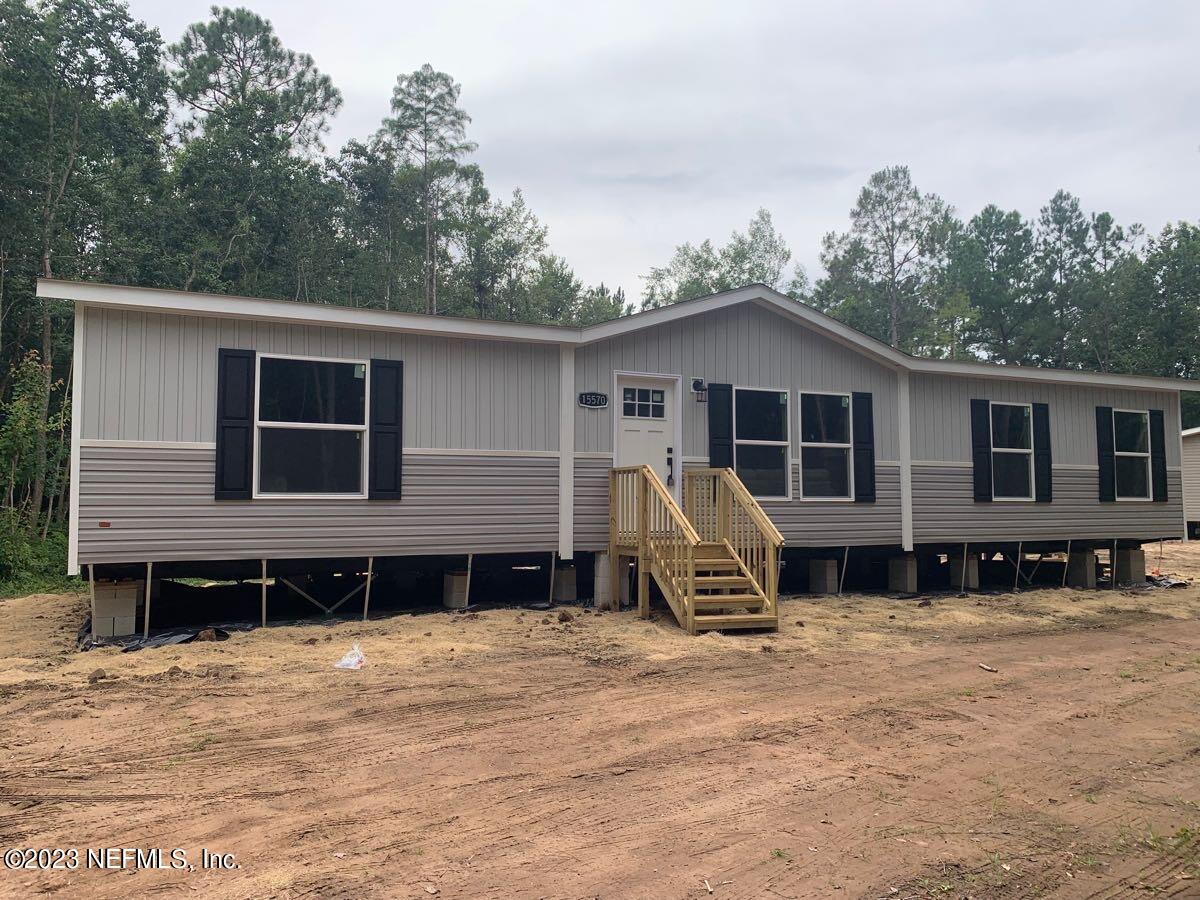 15570 Parete Road Jacksonville, FL 32218 - Photo 1 of 28 Front of Home