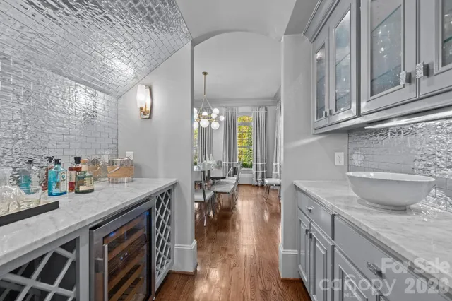 a kitchen with sink and cabinets