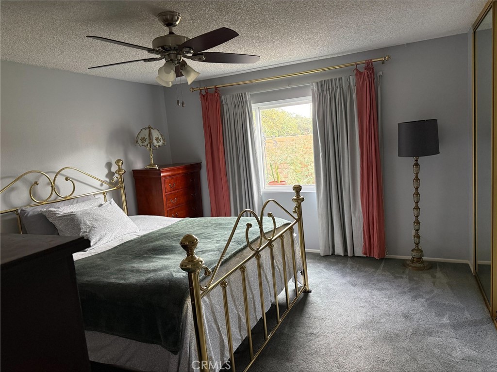 1114 Bottle Tree Way Hemet, CA 92545 - Photo 12 of 23 a bed room with furniture and a window