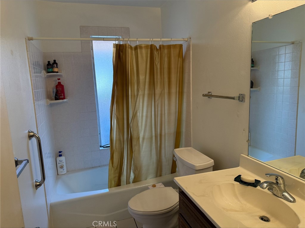 1114 Bottle Tree Way Hemet, CA 92545 - Photo 16 of 23 a bathroom with a sink and toilet