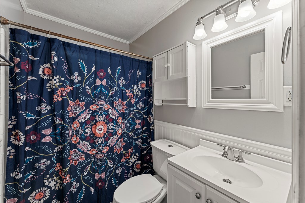 5422 Colony Drive Columbus, GA 31909 - Photo 15 of 32 a bathroom with a sink toilet and shower