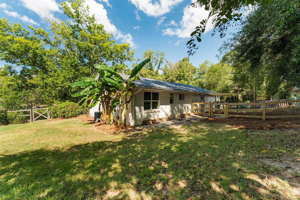5422 Colony Drive Columbus, GA 31909 - Photo 27 of 32 a front view of a house with yard tree and green space
