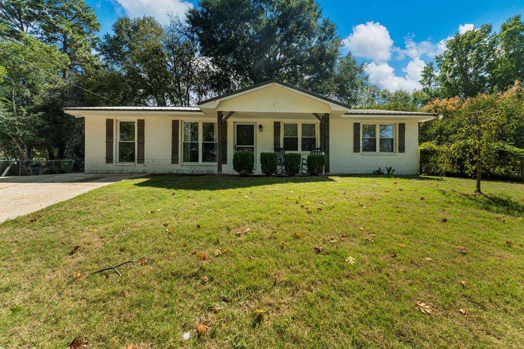 5422 Colony Drive Columbus, GA 31909 - Photo 28 of 32 a front view of a house with a garden