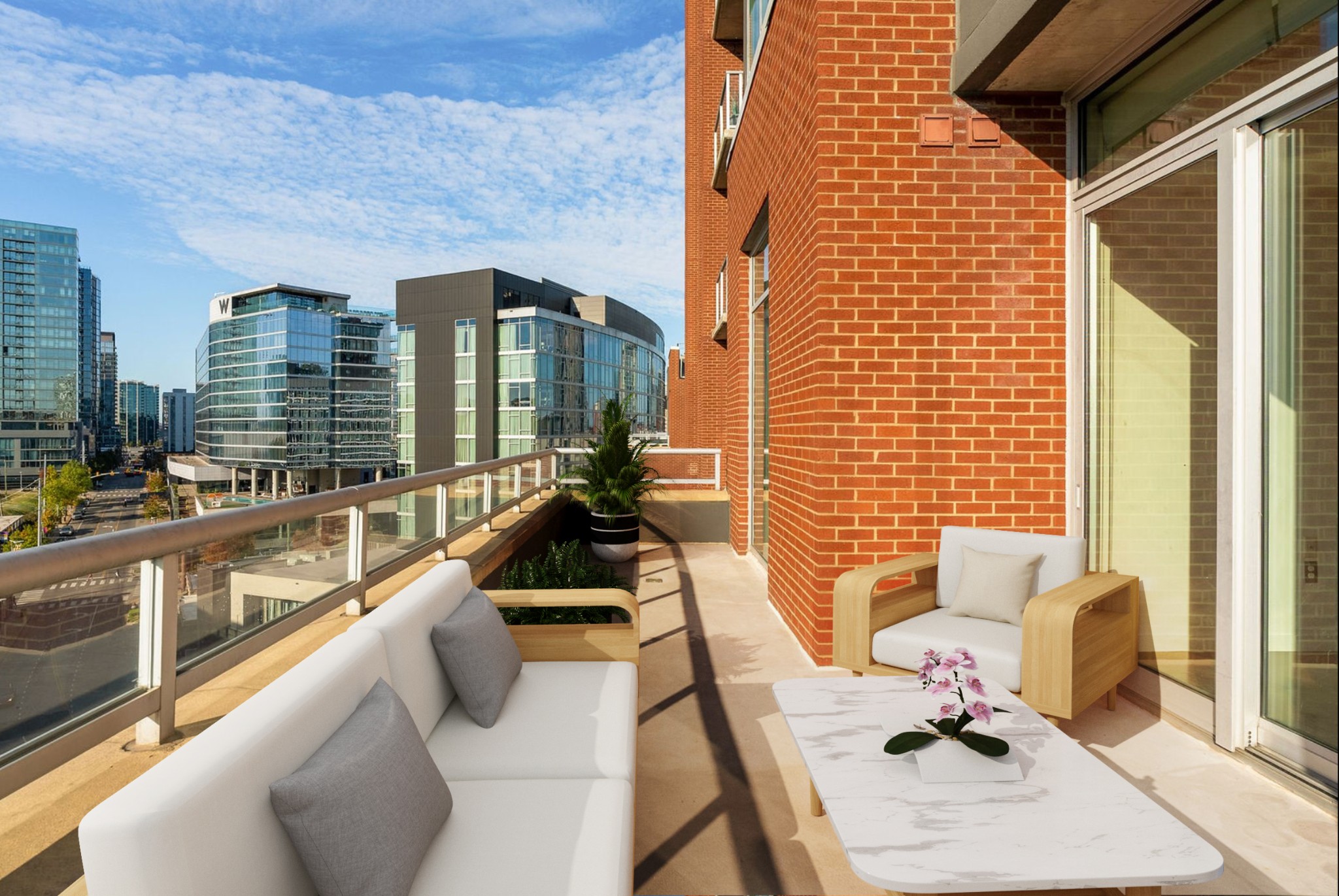 a view of balcony with couch and chairs
