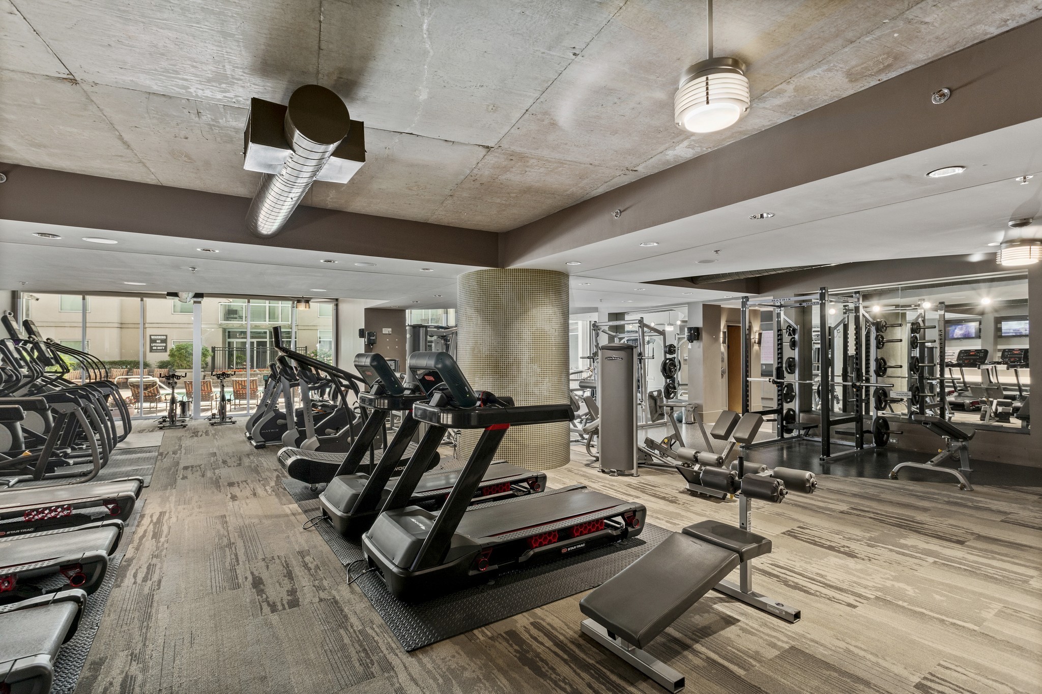 600 12th Avenue South, Unit 829 Nashville, TN 37203 - Photo 25 of 32 a view of a room with gym equipment